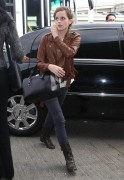 Emma Watson - booty in jeans, departing on a flight at LAX airport in Los Angeles (10-23-13)